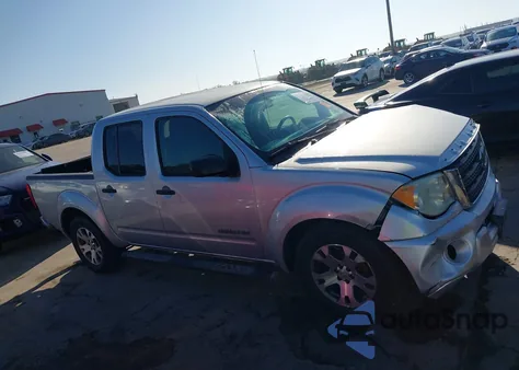 2009 Suzuki Equator Sport from USA, damaged, VIN 5Z6AD07U79C410339